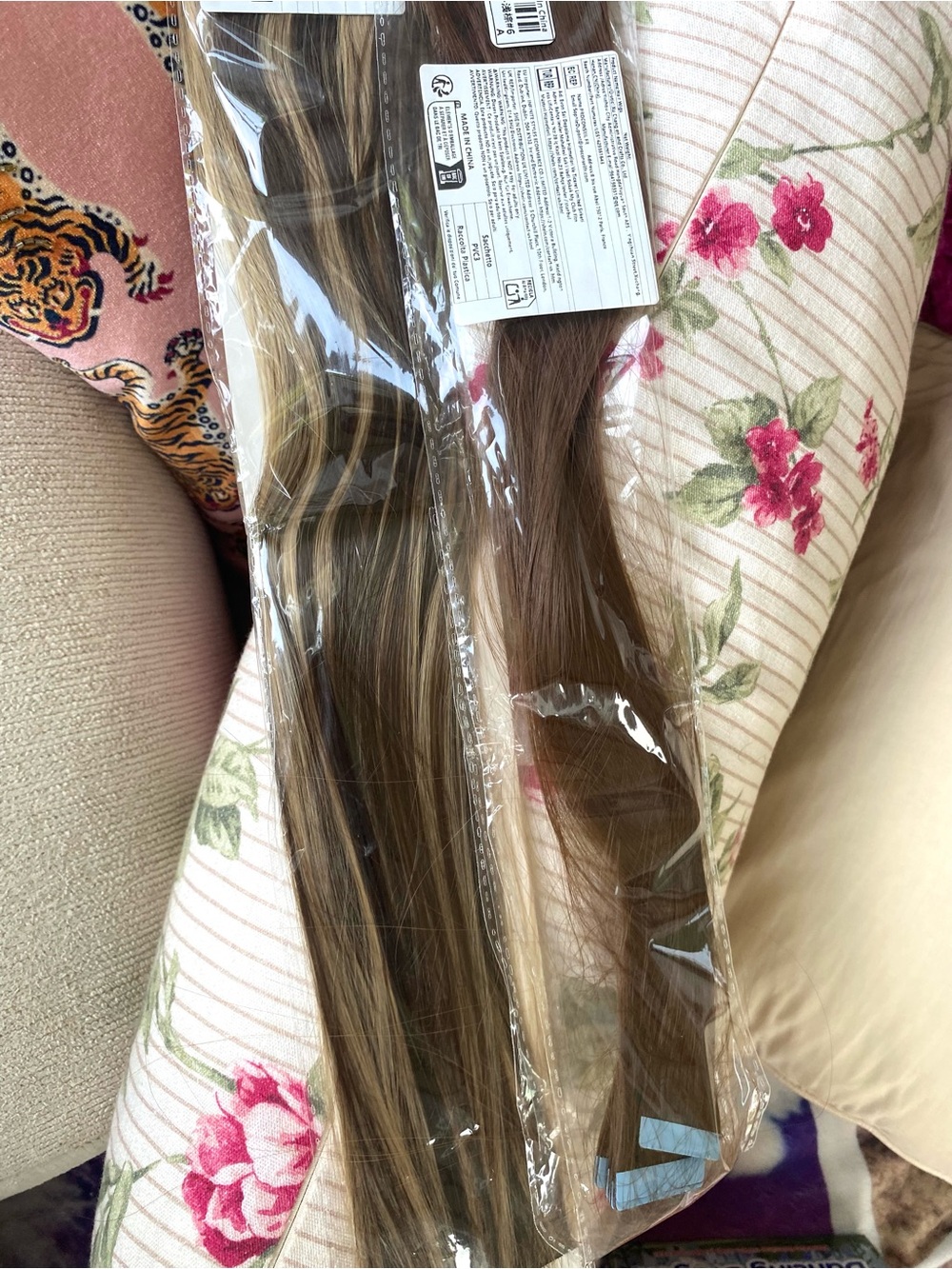 two packs of tape in hair extensions in a two toned blonde/ taupe & a brown